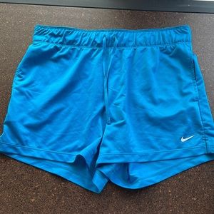 Brand new blue Nike athletic shorts.